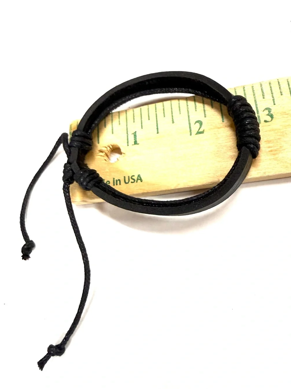 Black leather unisex bracelet with braided rope accents and ties nsb
